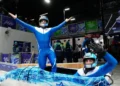 Adam Edelman, a la izquierda, y Menachem Chen celebran tras una bajada de bobsleigh de dos integrantes en Cortina d’Ampezzo el 16 de febrero de 2026.