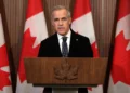Mark Carney habla sobre el incendio en la base militar de Wainwright, en Ottawa, Canadá, el 18 de octubre de 2026.
