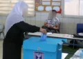Votación en un centro electoral